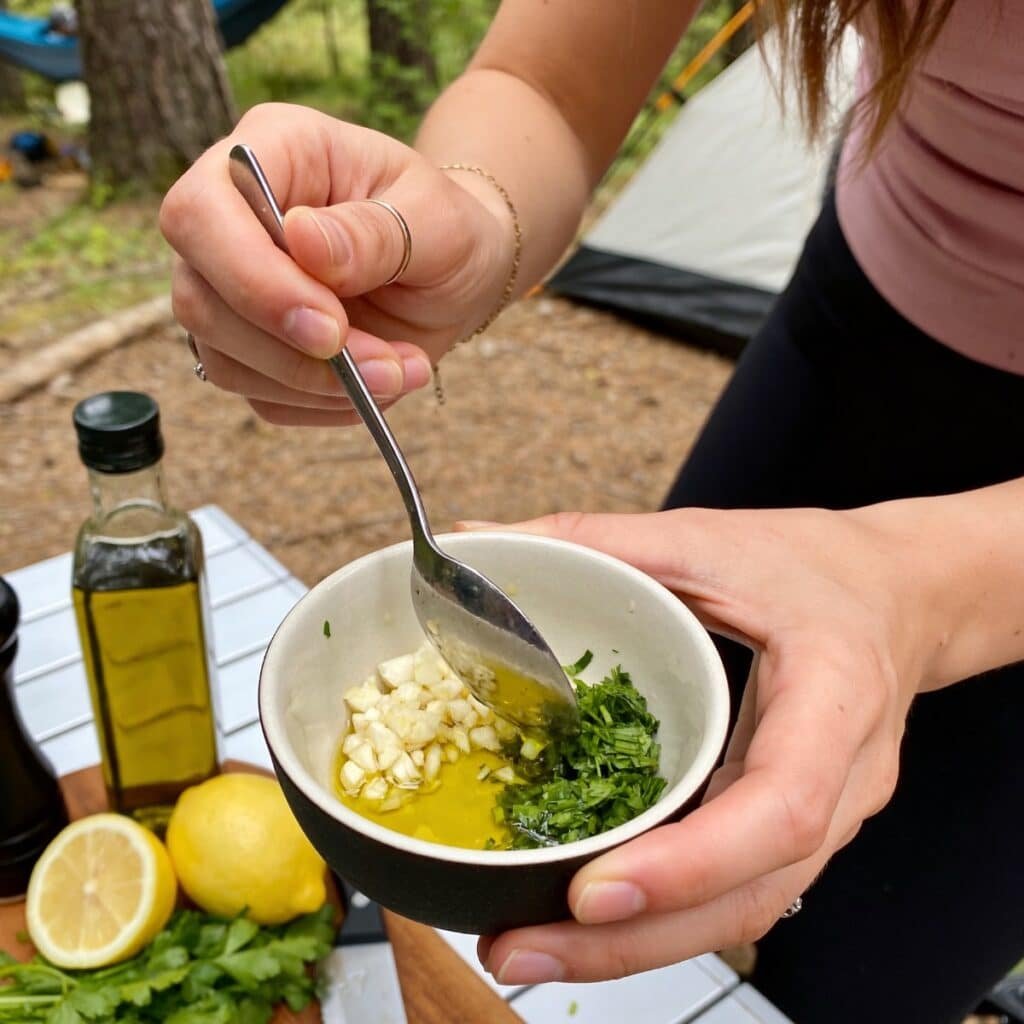 Mixing Garlic Herb in a bowl