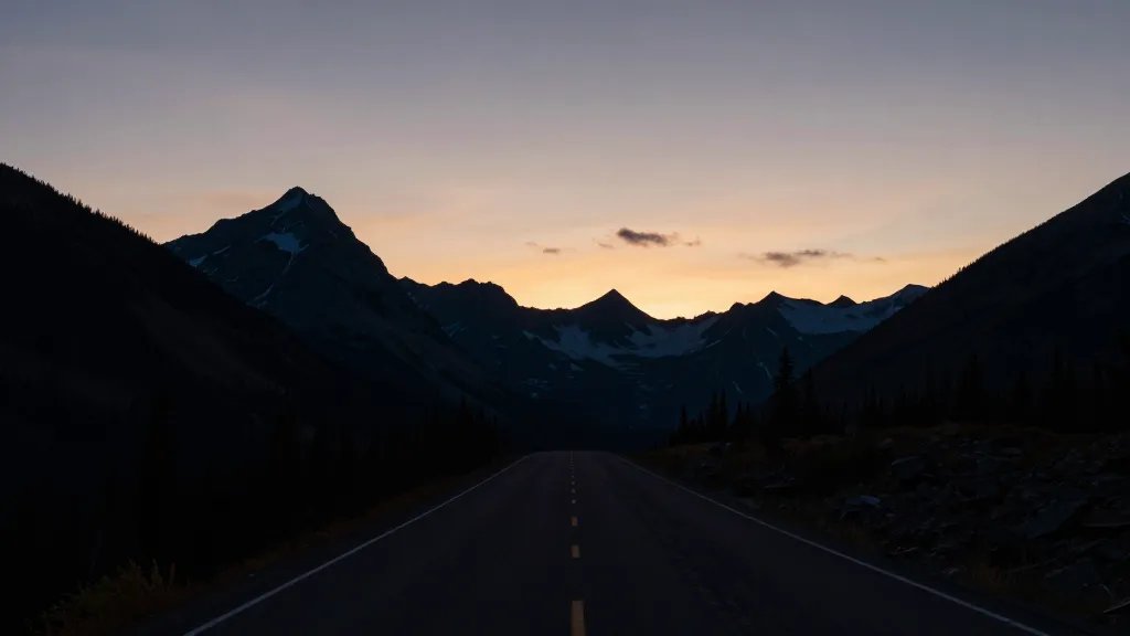 Sunset silhouette of Going-to-the-Sun Road pass in Glacier National Park