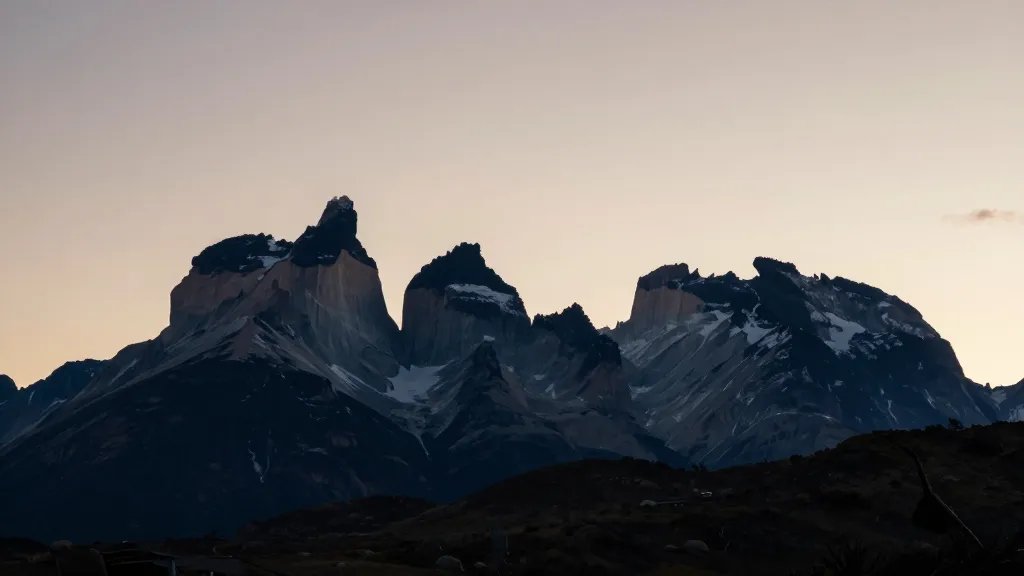 Torres del Paine distant mountain silhouette at dawn