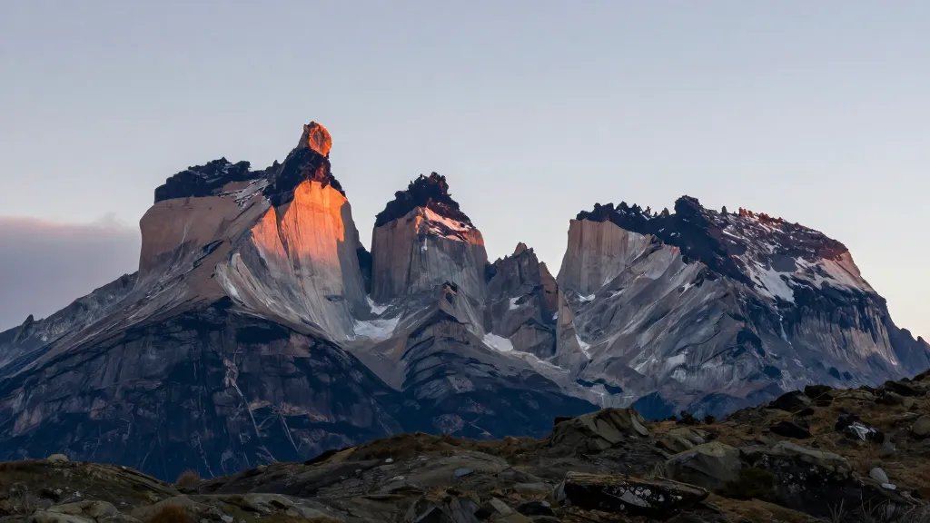 distant view of Torres del Paine granite towers at dawn