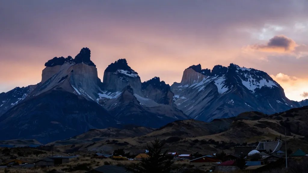 sweeping horizon over Patagonian valley with Torres del Paine silhouettes