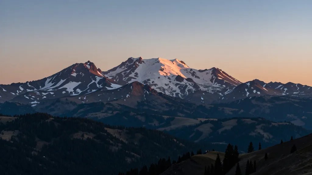 Distant alpine panorama of Lassen peak at dawn
