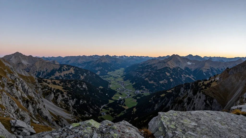 Panoramic valley from Alpine Ridge summit at dawn
