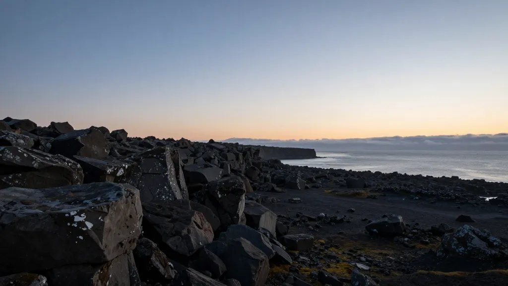 Distant dawn over Snæfellsnes Peninsula basalt coastal ridge, Iceland