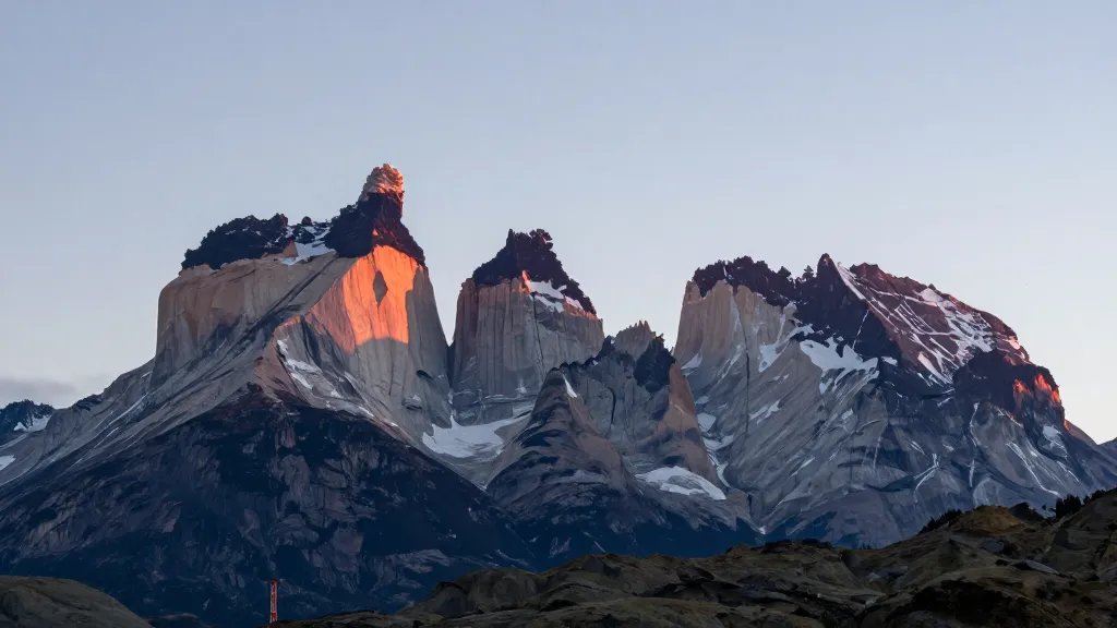 Distant view of Torres del Paine granite towers at dawn
