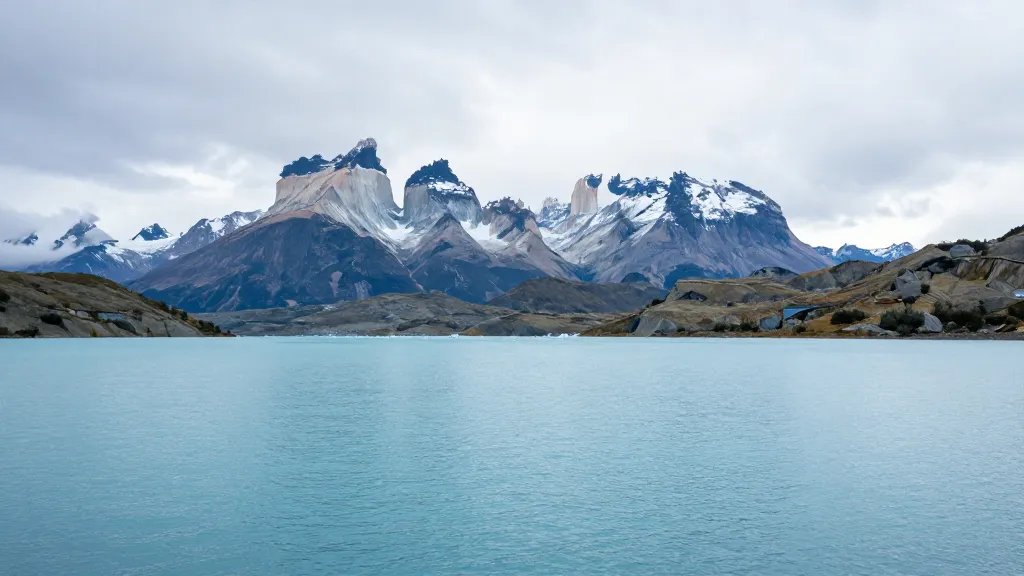 Wide, distant shot of Patagonian ice-blue Lacustre lagoons near Paine